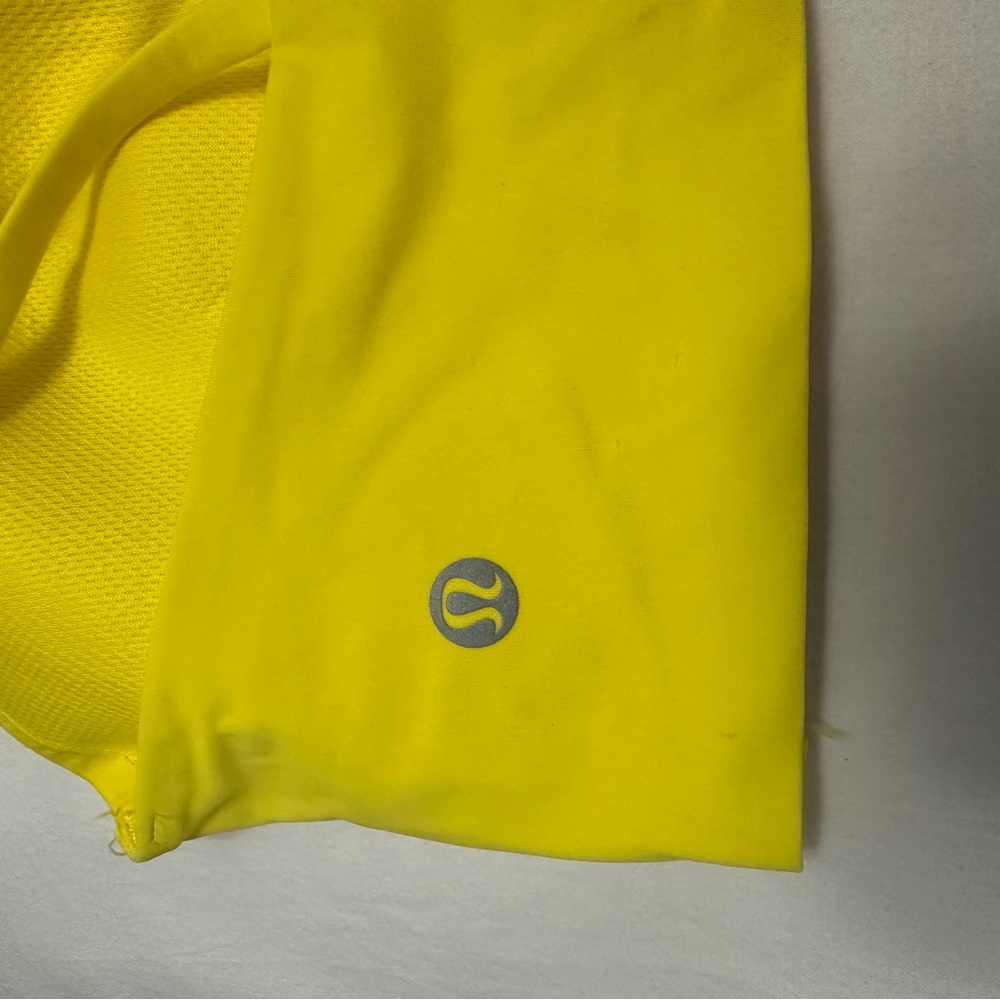 Bright yellow lululemon sports bra